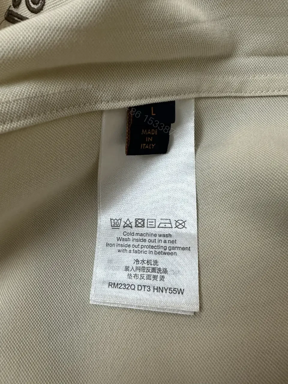View 8 of White Cotton Polo Shirt with Black Accent Louis Vuitton Style Key Feature Pocket Short Sleeve Shirt