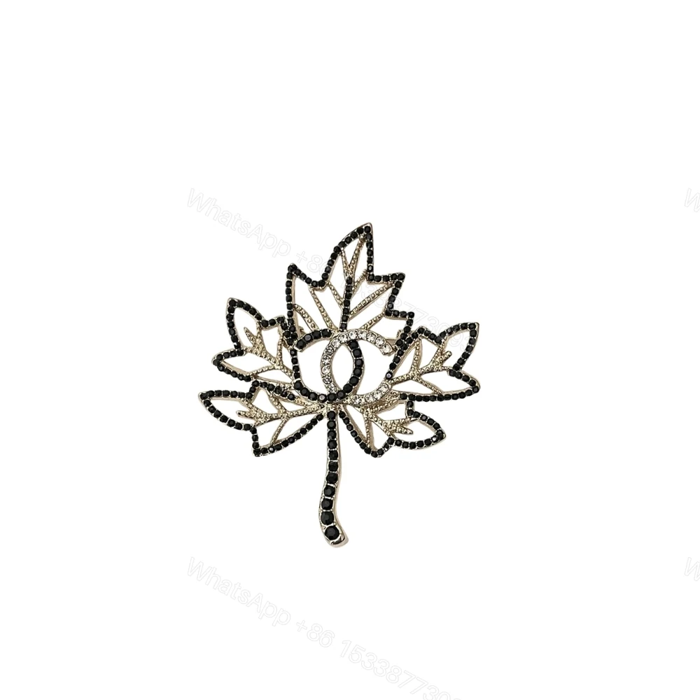 Chanel Cc Leaf Brooch Black Gold — view 1