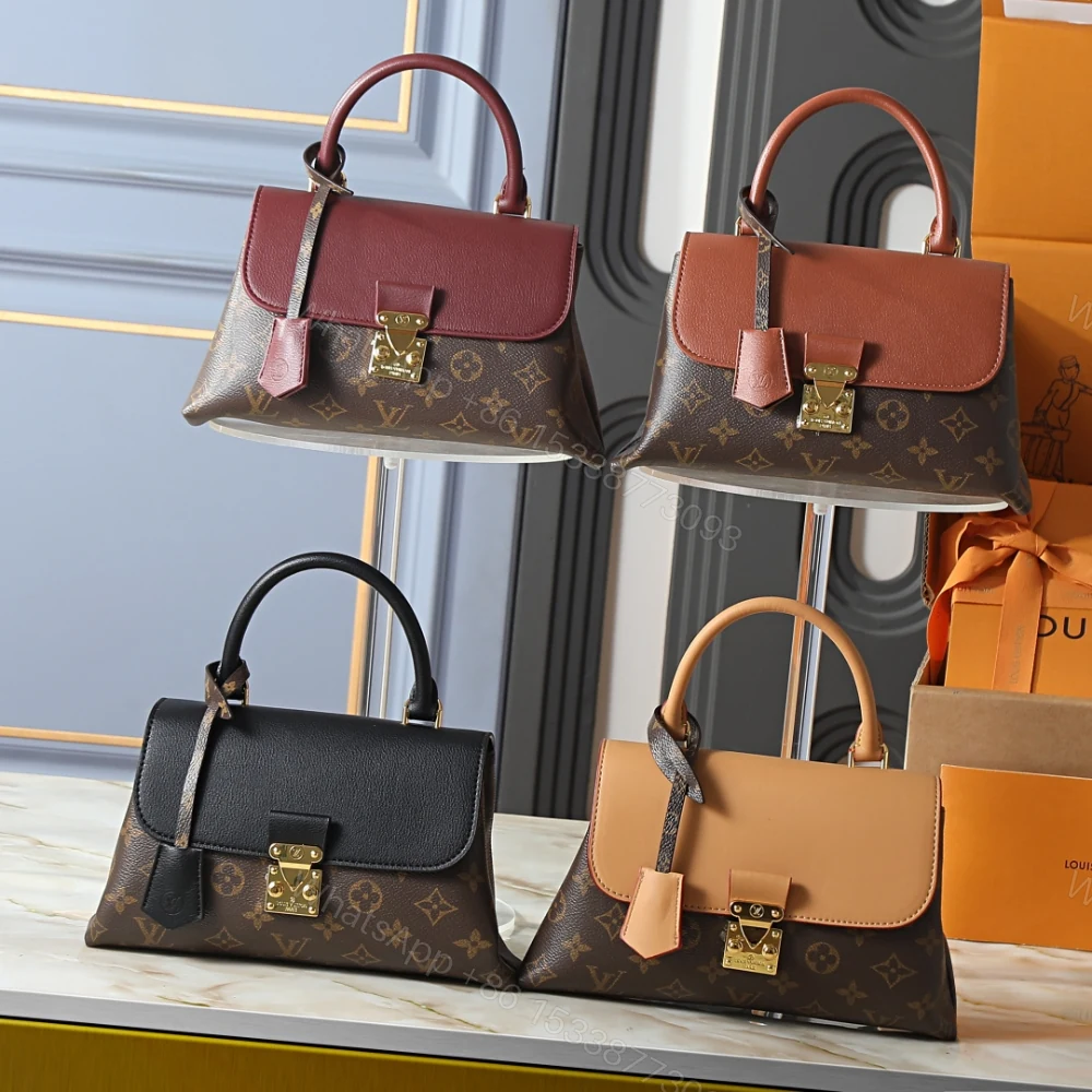 View 9 of Louis Vuitton Madeleine BB Monogram Cognac 24Cm M28288
