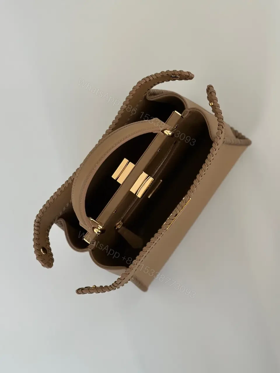 View 9 of Taupe-Tone Leather Crossbody: Braided Edge, Turn-Lock Bag