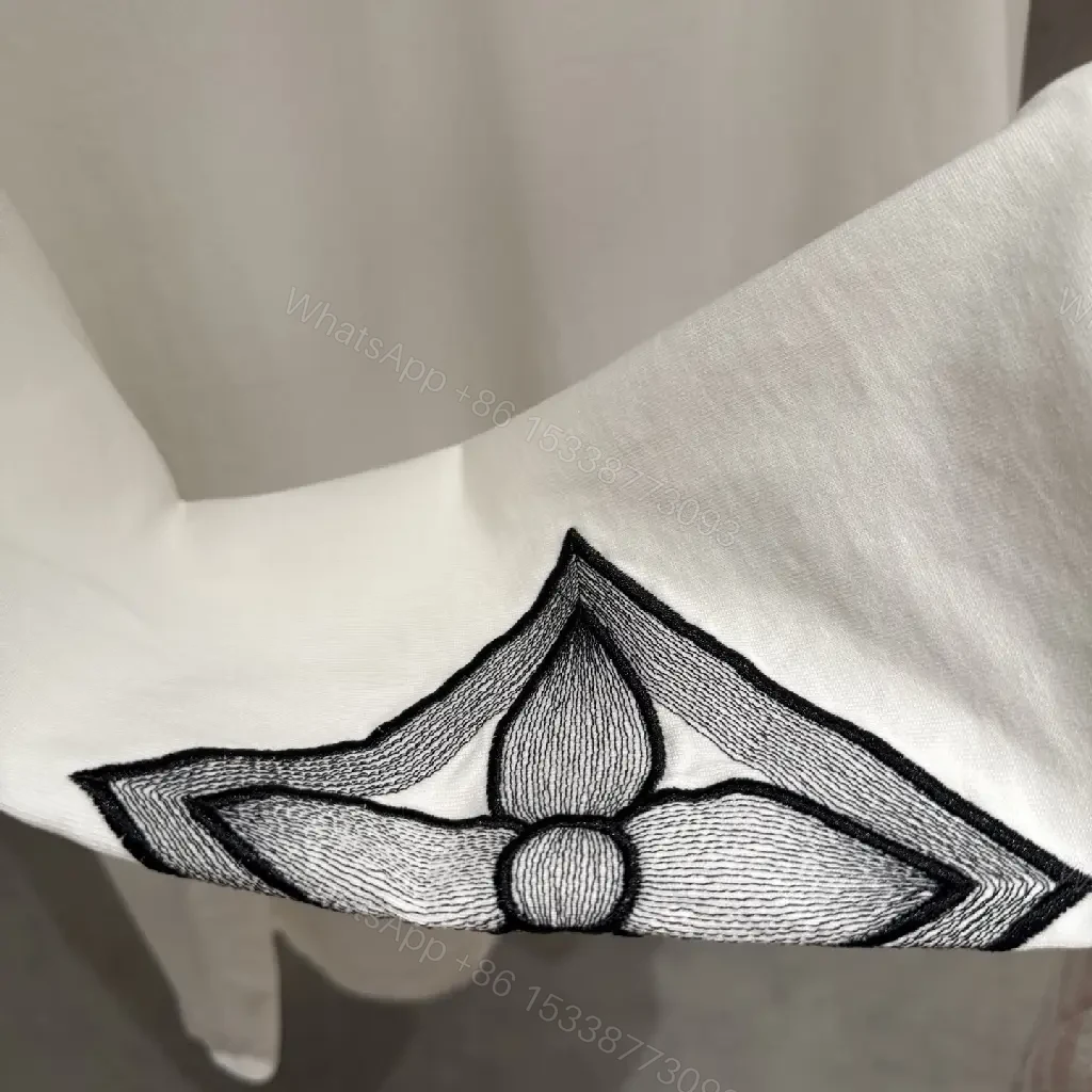 View 6 of White Cotton-Blend Pullover with LV Logo & Architectural Sleeves