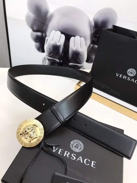 View 3 of Bold Medusa Buckle Belt: Luxury Black Leather Accessory