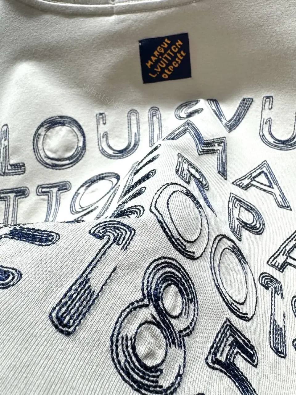 View 6 of Neutral Beige Luxe Tee: Soft Knit, Subtle LVM Monogram, Modern Fit