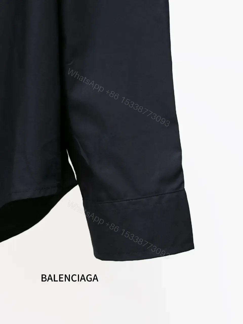 View 8 of Structured Minimalist Button-Front Shirt with Subtle Crest, Black