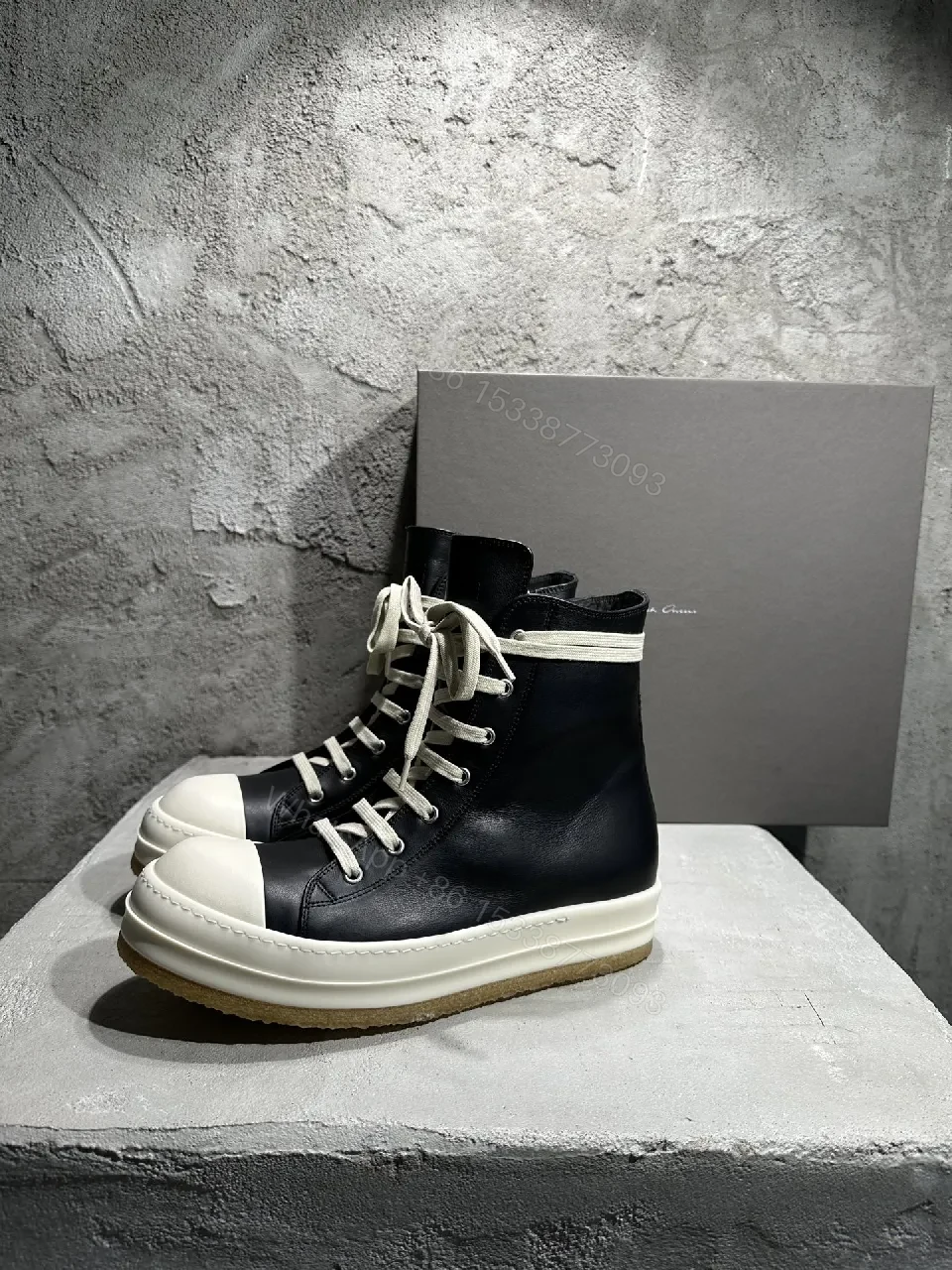 Black Leather High-Top Sneakers with Off-White Accents — view 1