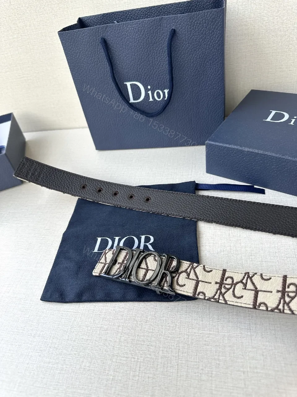 View 2 of Monogram Canvas Belt with Gold Logo Buckle, Black Interior