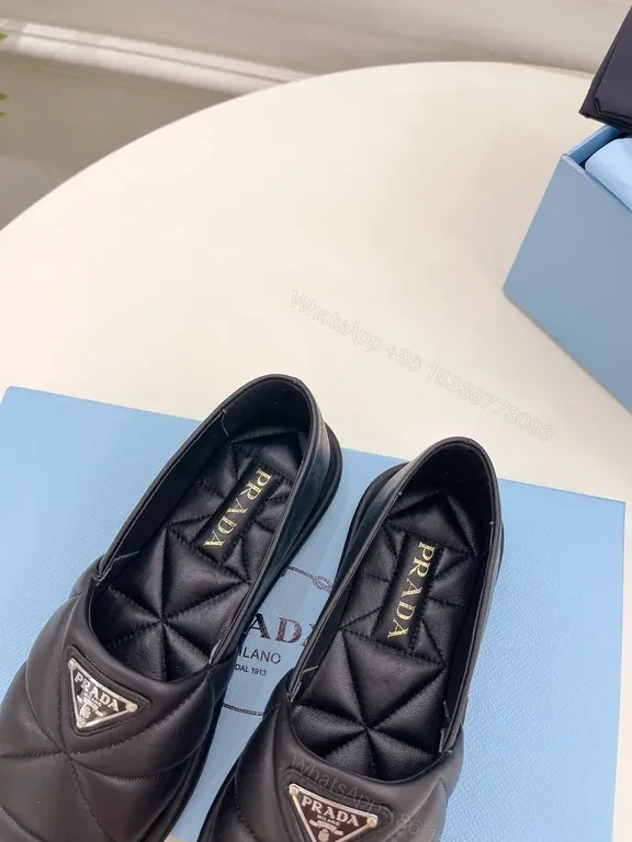 View 7 of Quilted Leather Slip-Ons with Prada Triangle - All-Day Comfort