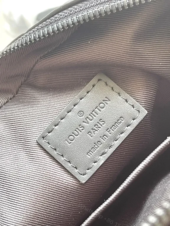 View 9 of Black Monogram Leather Messenger: Compact, Weather-Ready Luxury