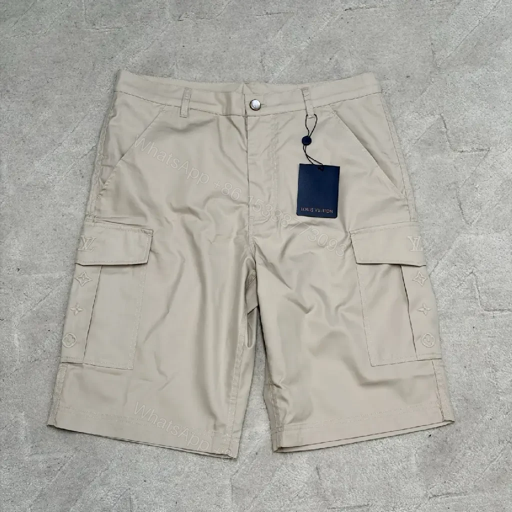 View 2 of Beige Nylon Cargo Shorts with Louis Vuitton Tag