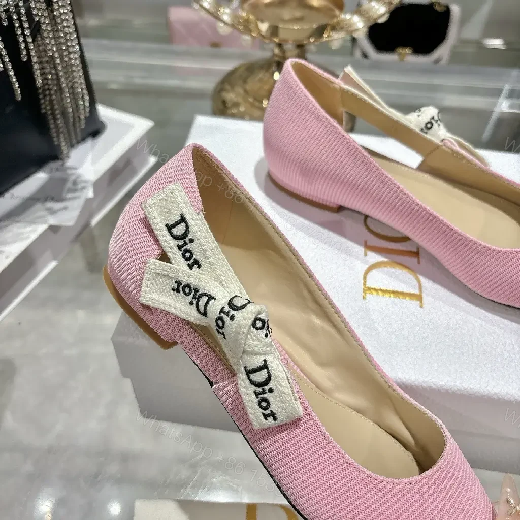 View 9 of Soft Pink Textured Slingback Heels with Logo Strap – Modern Luxe Pumps