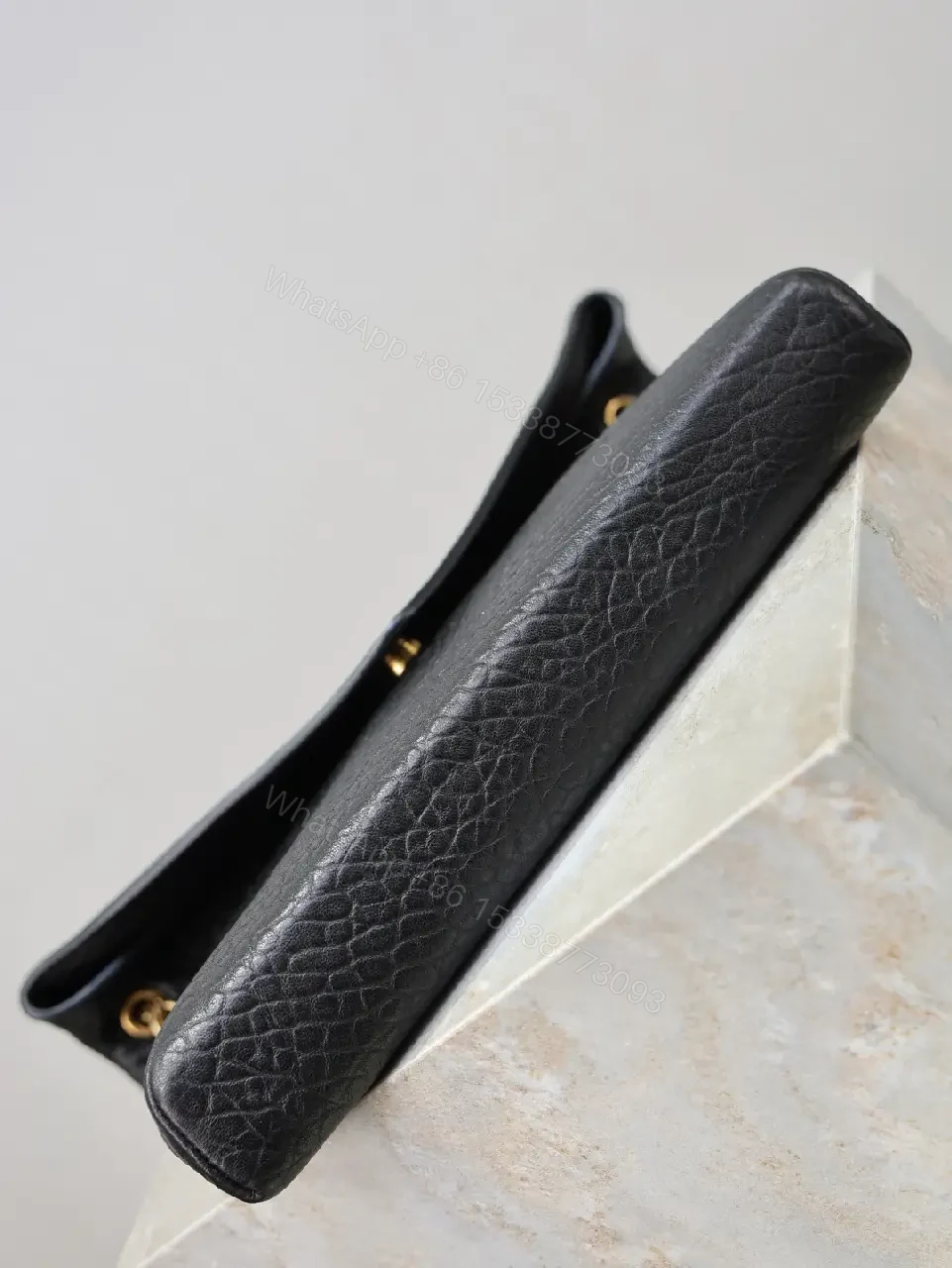 View 7 of Pebbled Leather Envelope Flap Bag, Gold Logo, Day-to-Night Versatility