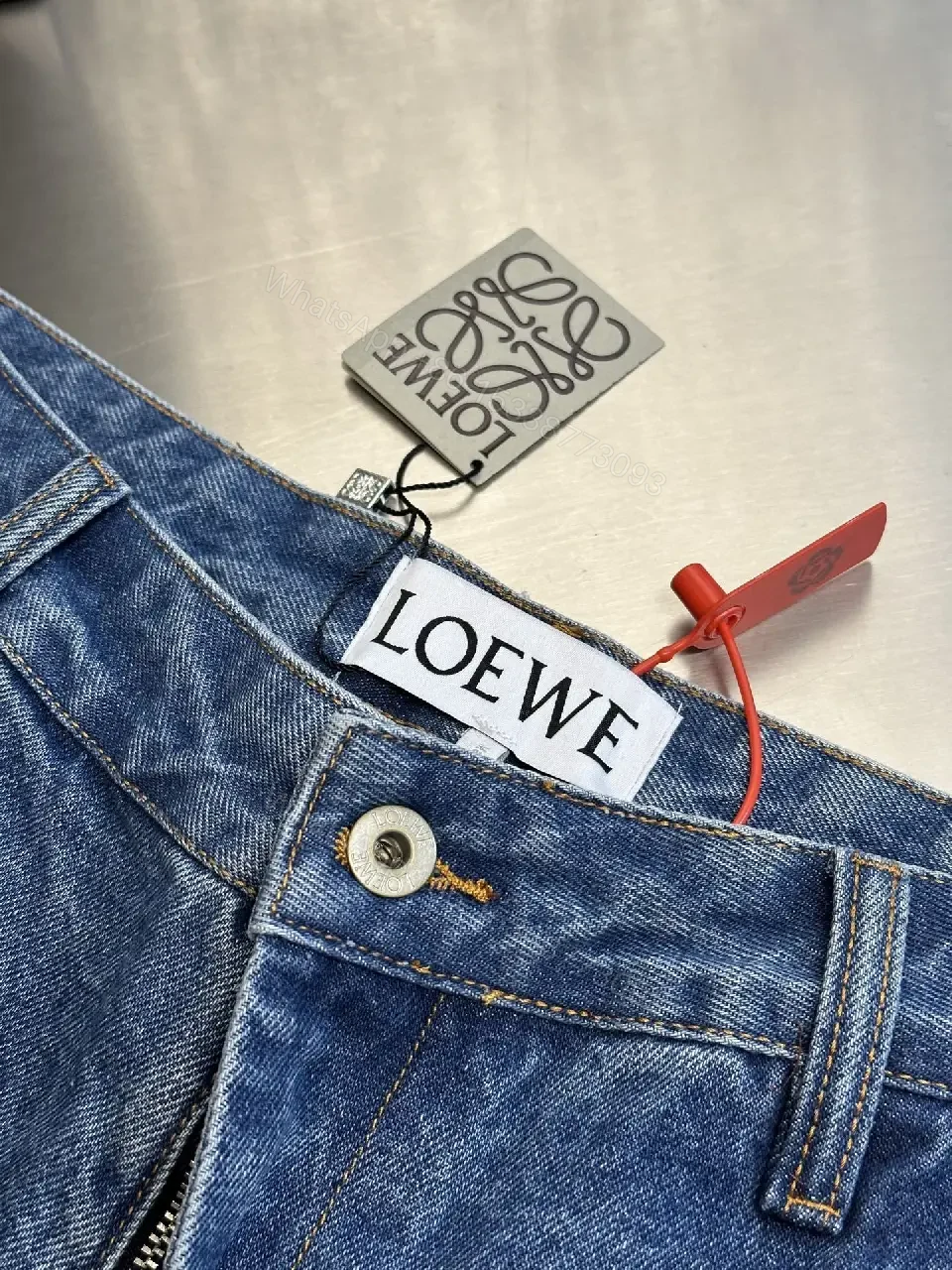 View 5 of Denim Shorts: White Embroidered Logo, Relaxed Fit, Luxe Style