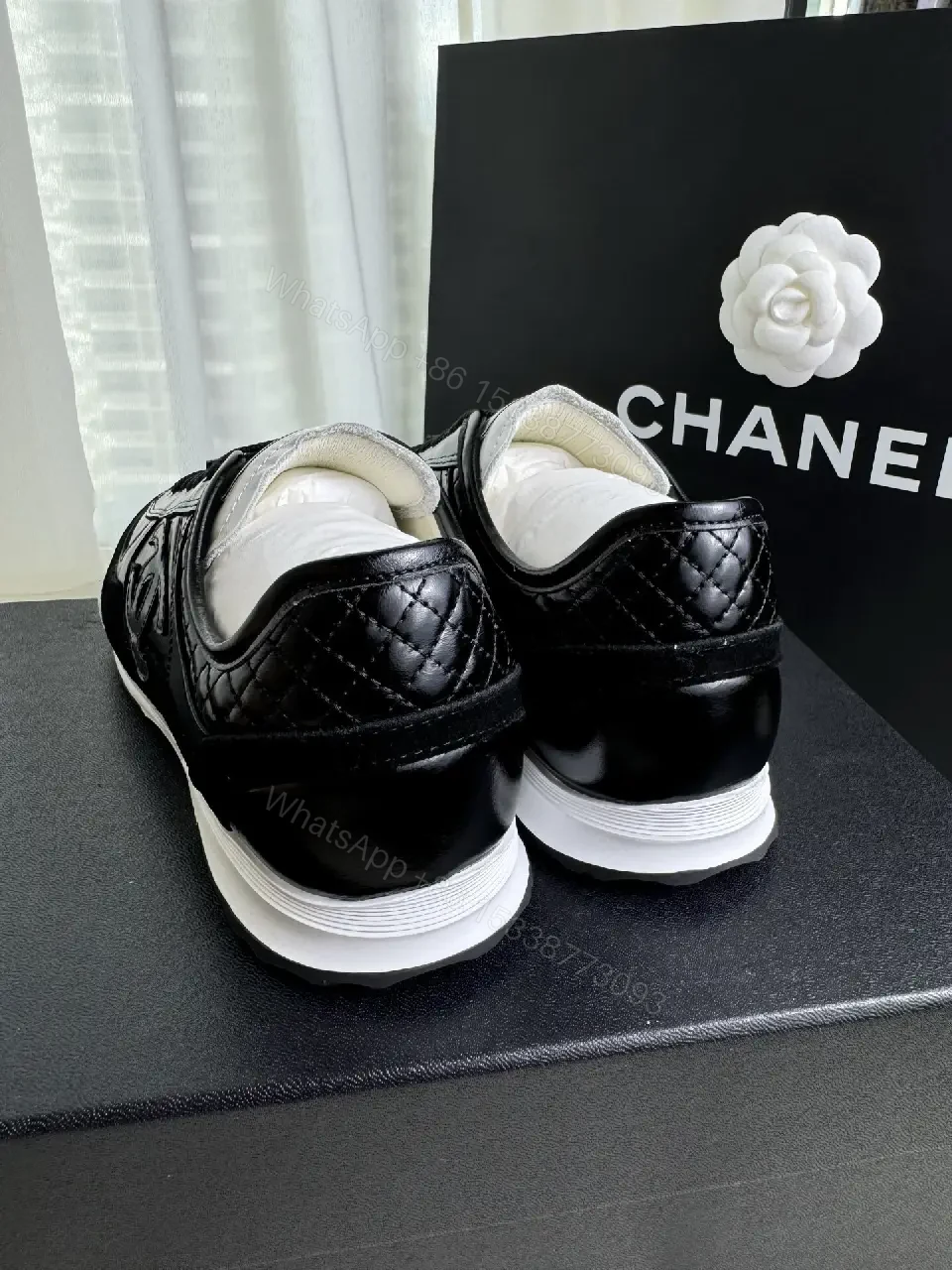 View 2 of Chic Black Leather Trainer — Luxury Comfort, Subtle Logo