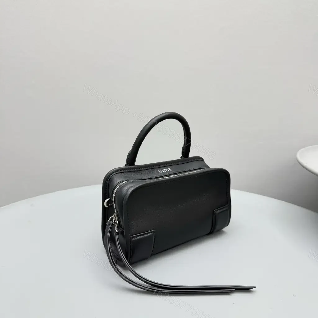 View 4 of Structured Black Leather Mini Bag | Compact, Versatile Carryall