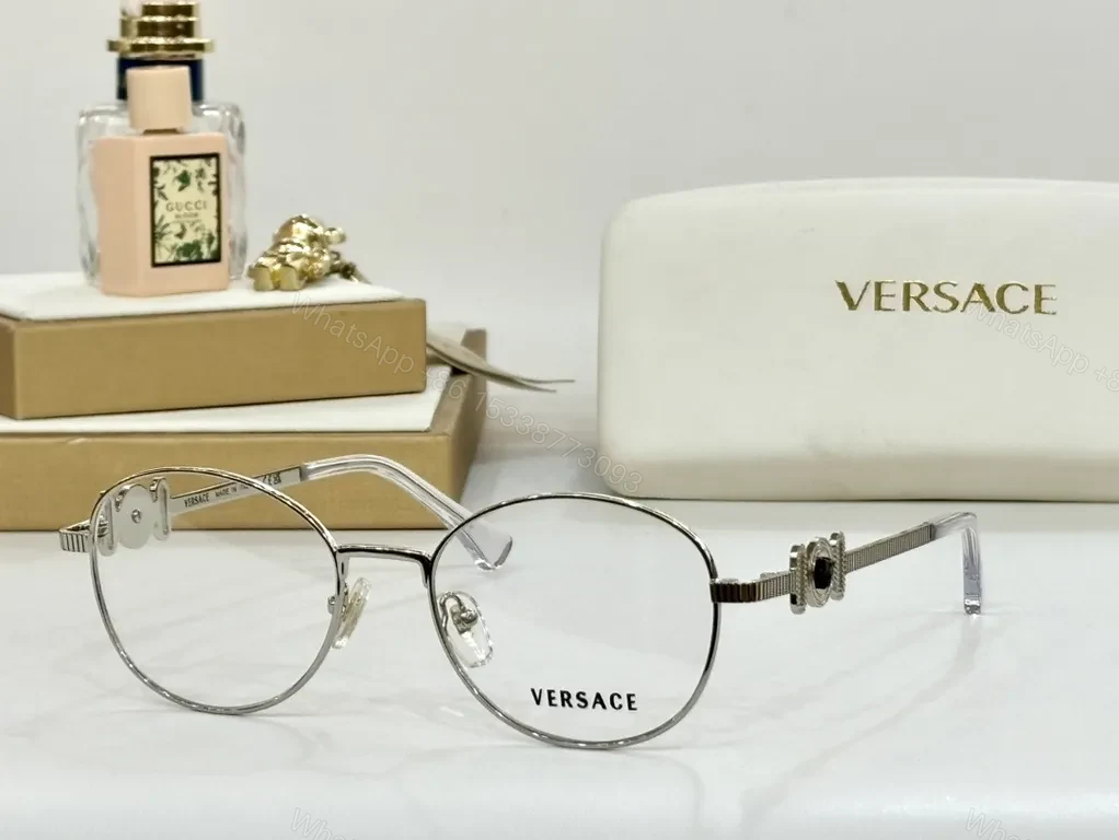 View 6 of Refined Round Eyewear: Luxury Metal Frames with Signature Detail