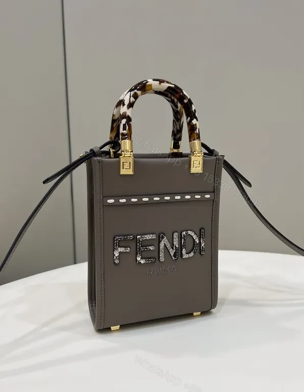 View 3 of Structured Mini Bag: Sculpted Logo, Tortho Handle, Gold Accents