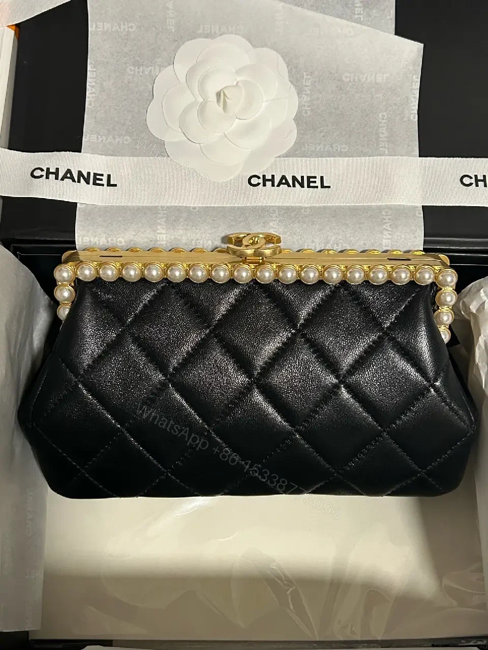 Black Quilted Leather Clutch with Pearl Trim, Gold Frame, Elegant — view 1