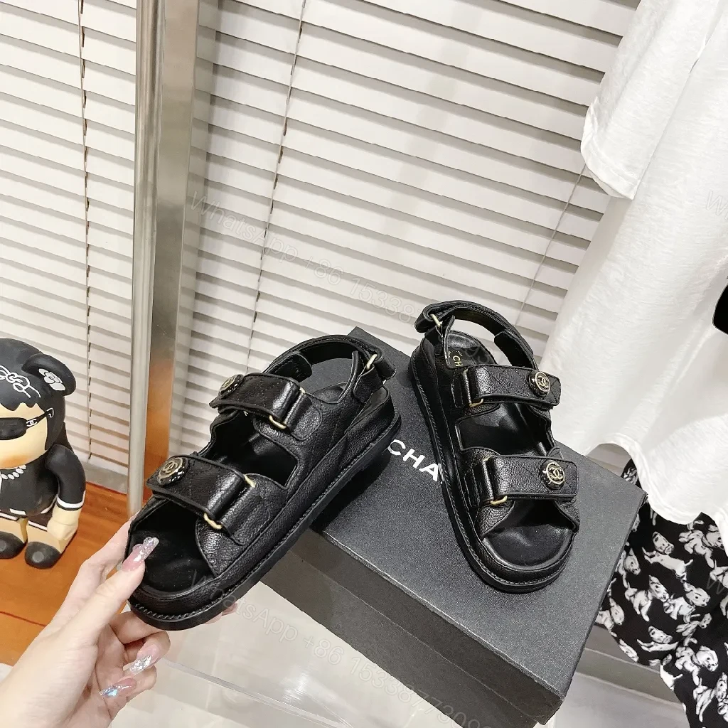 View 3 of Chic Black Leather Sandals with Signature Hardware