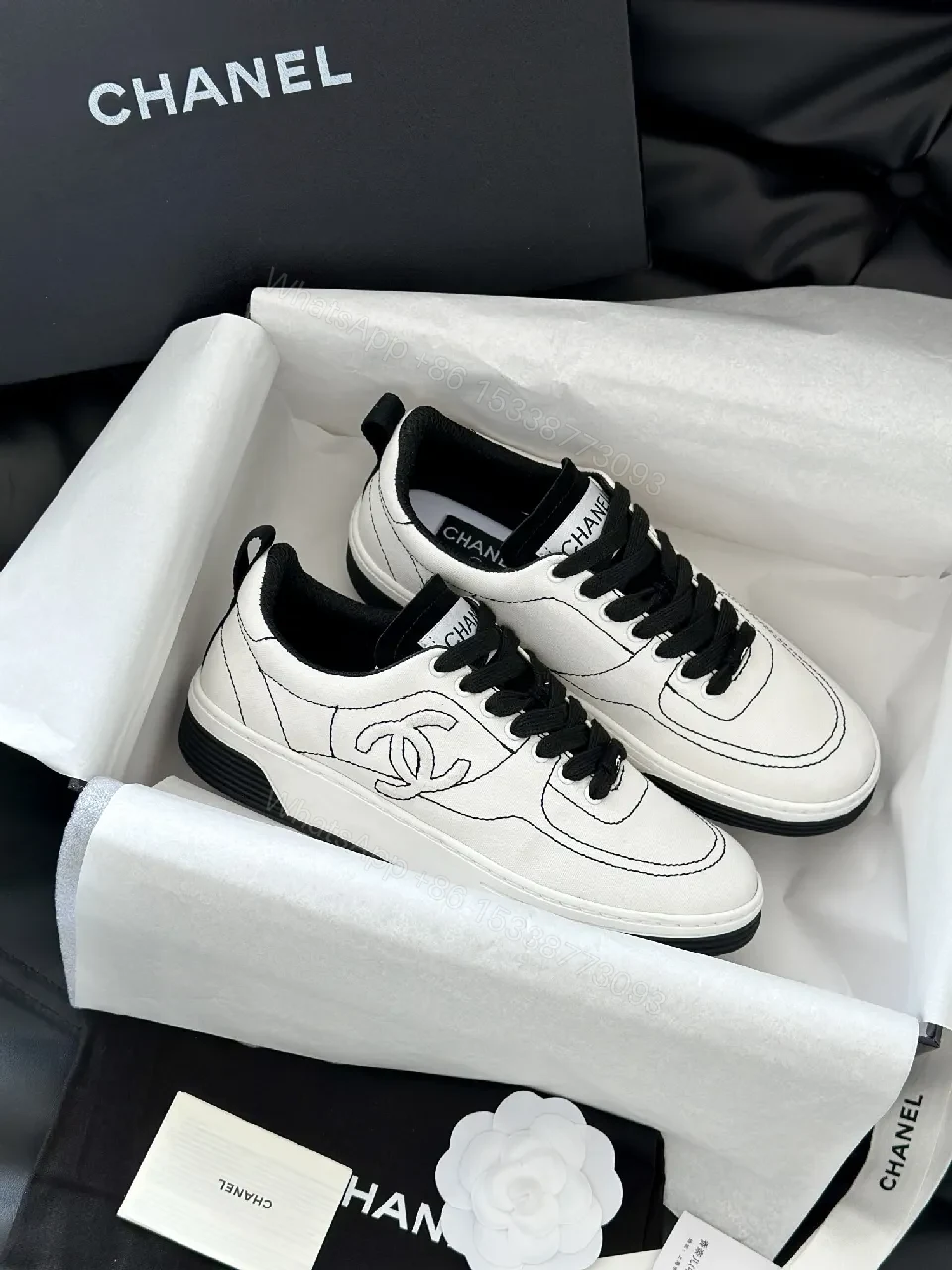 View 2 of Premium White Leather-like Low-Top Sneakers: Sleek, Comfortable, Versatile