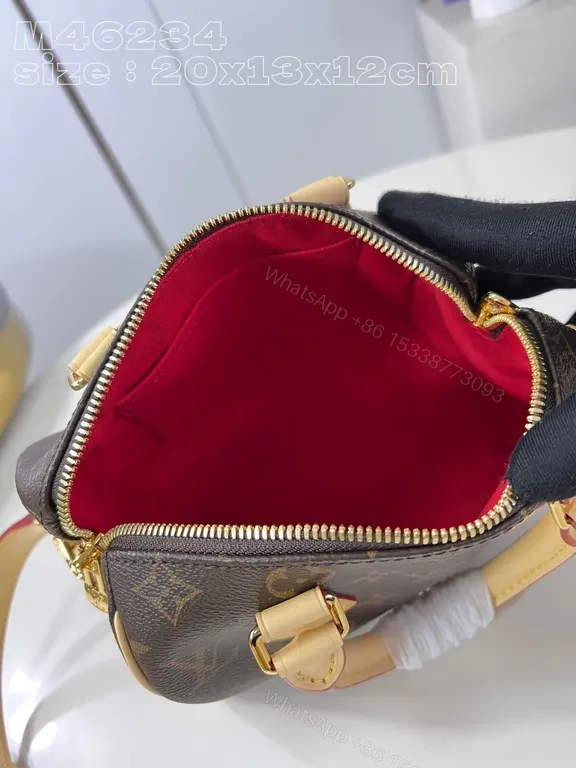 View 2 of Monogram Luxe Compact Handbag: Gold Hardware, Leather Trim
