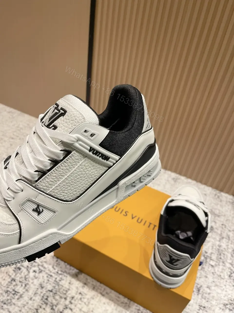 View 8 of White Leather Runner Sneakers with LV Detailing