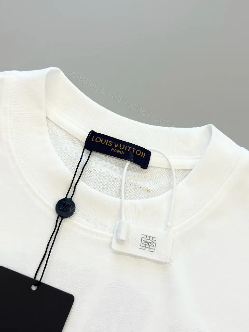 View 9 of White Cotton Structured Polo Tee with Subtle LV Monogram