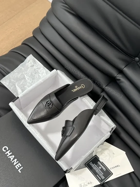 View 8 of Chic Black Leather Mules with CC Detail - Luxury Comfort
