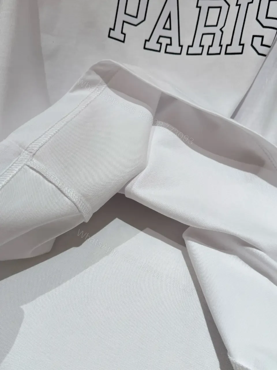 View 3 of White cotton long-sleeve T-shirt with Paris print for everyday luxury