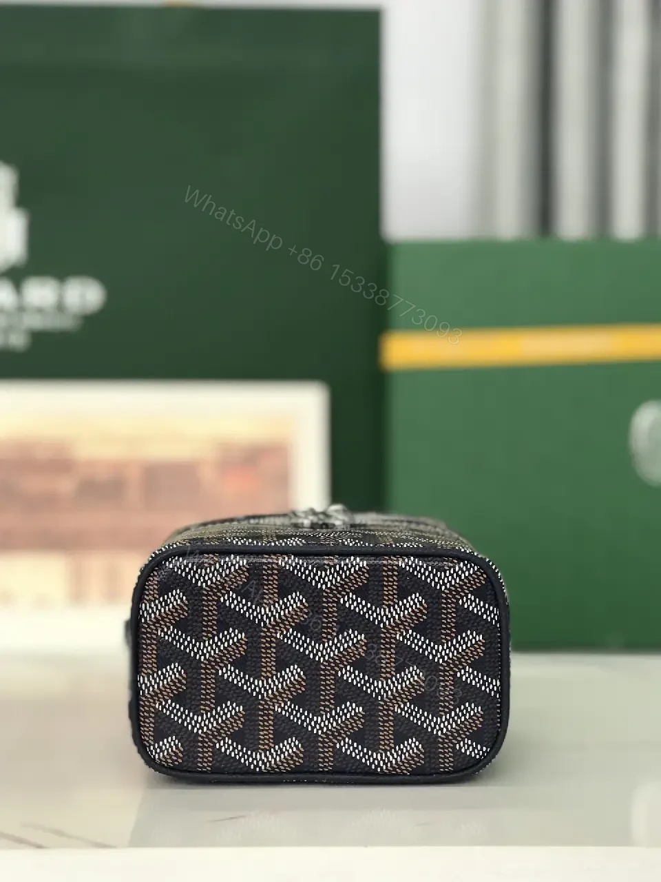 View 5 of Colorful coated-canvas pouch with distinctive pattern, compact design, durable, luxury vibe
