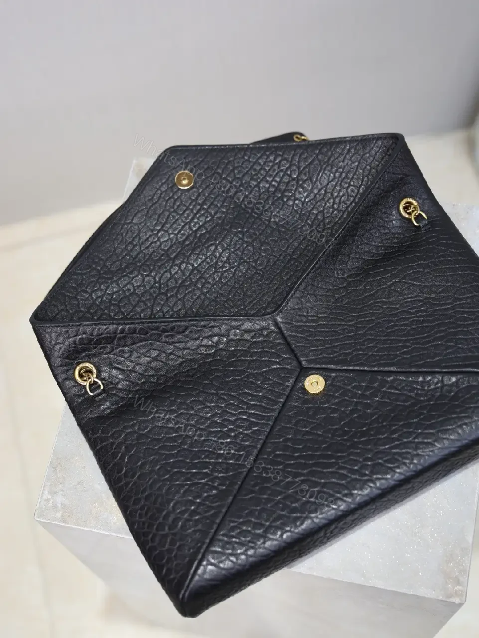 View 2 of Pebbled Leather Envelope Flap Bag, Gold Logo, Day-to-Night Versatility