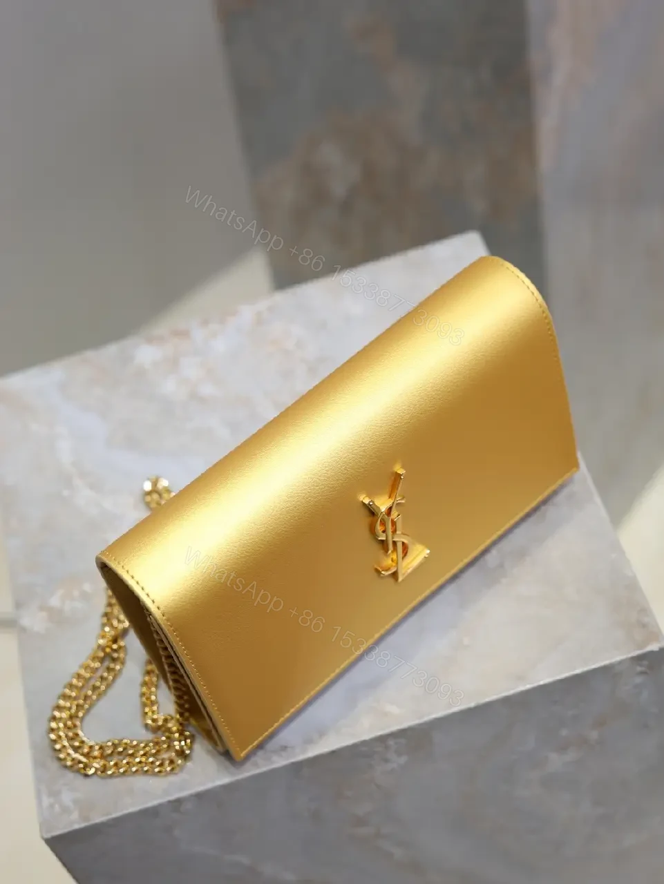 View 2 of Gold-Tone Leather Clutch Wallet with YSL Hardware