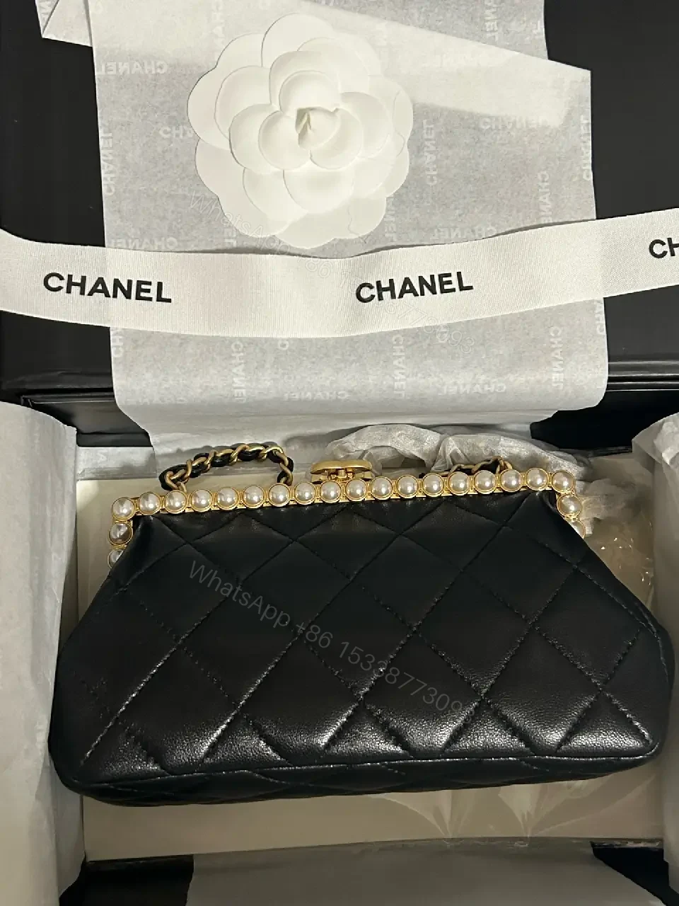 View 4 of Black Quilted Leather Clutch with Pearl Trim, Gold Frame, Elegant