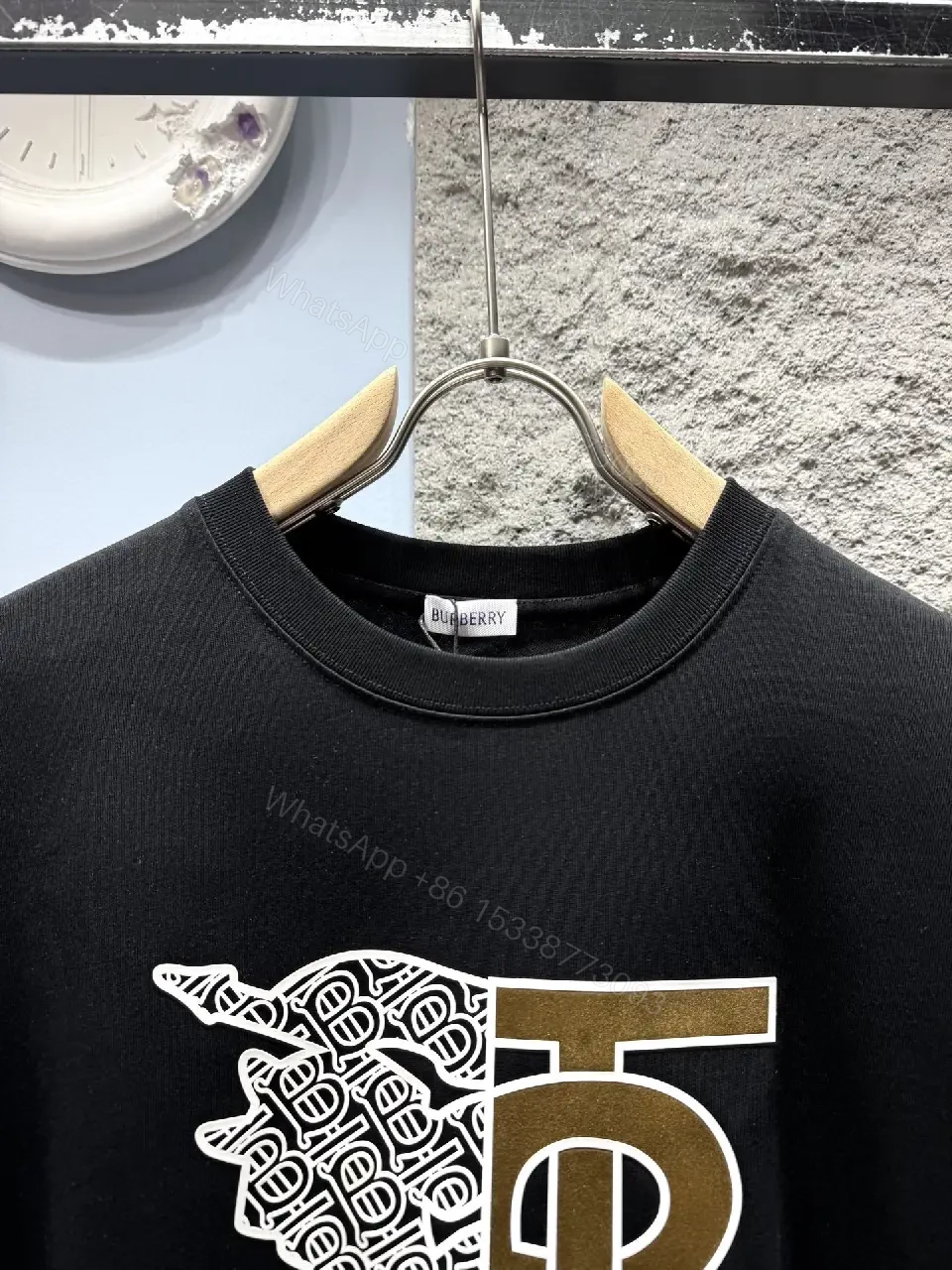 View 2 of Statement Black Cotton Tee with Bold Metallic Logo Detail