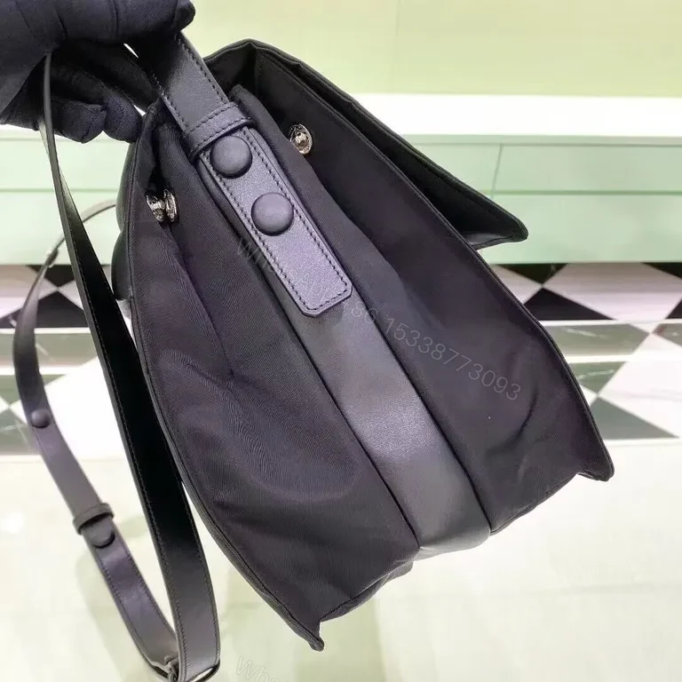 View 3 of Black Nylon Crossbody Bag with Purple Strap - Compact Luxury City-Ready Bag