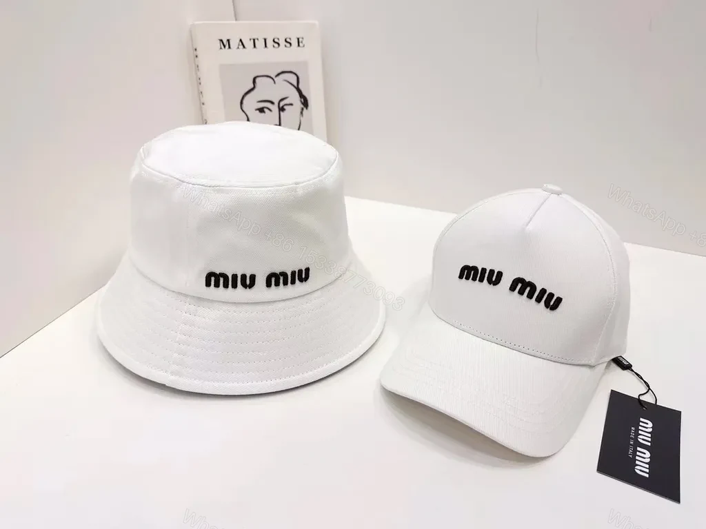View 2 of Monochrome MIU MIU Cap: Subtle Logo, Everyday Luxury
