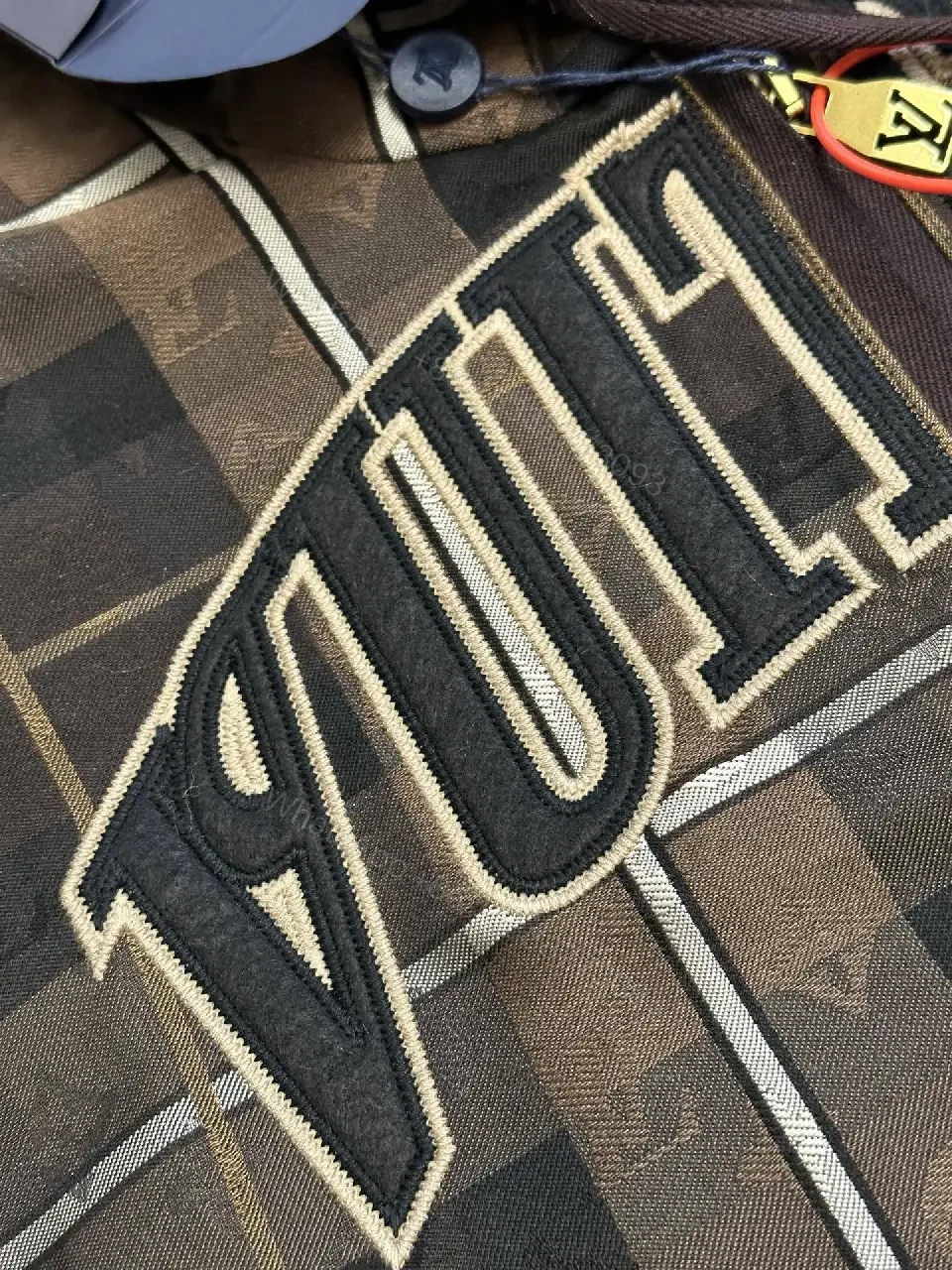 View 5 of Bold Checkered Hoodie Jacket – Luxe Logo Streetwear Comfort