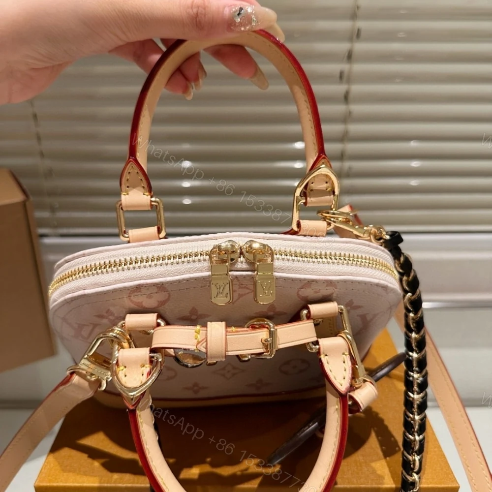 View 5 of Louis Vuitton Alma Mini LV And I Monogram Dune 25Cm K00015