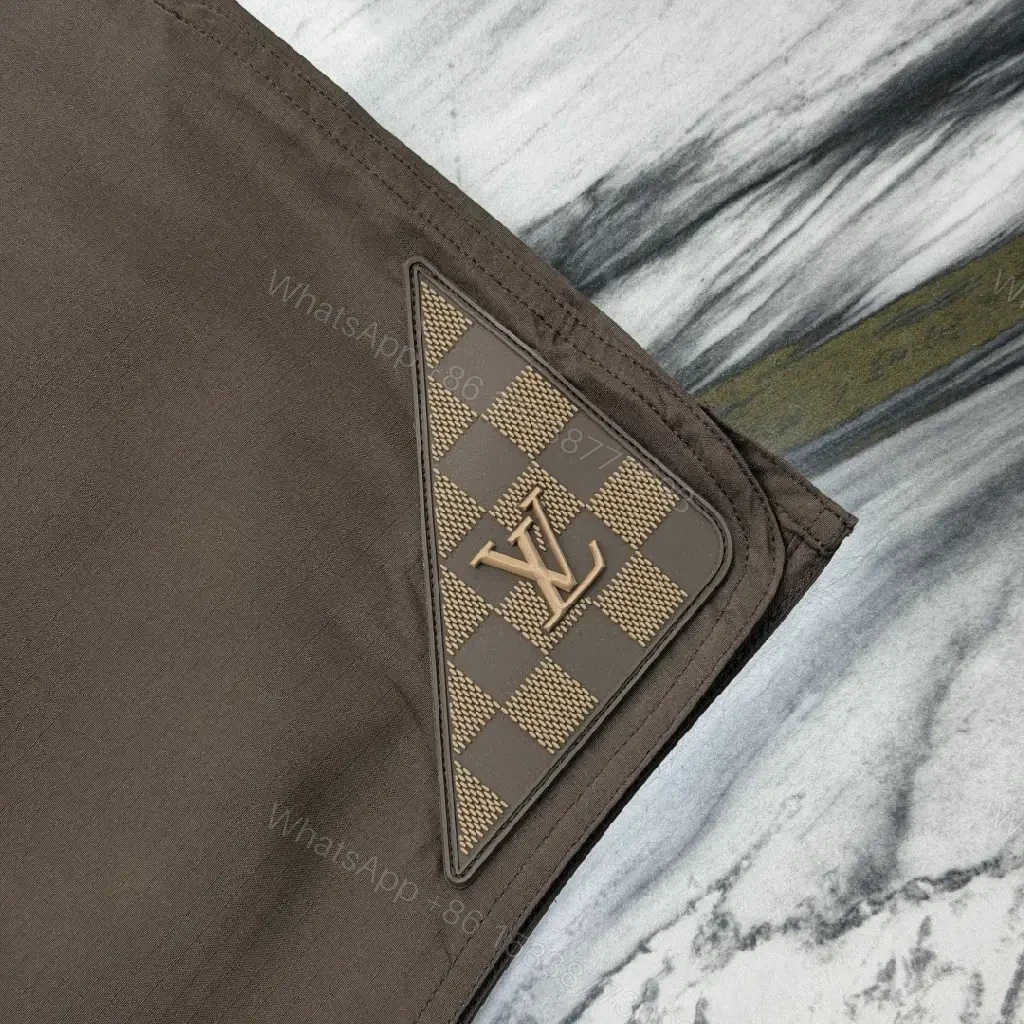 View 5 of Brown Nylon Casual Shorts Louis Vuitton Logo Patch Shorts