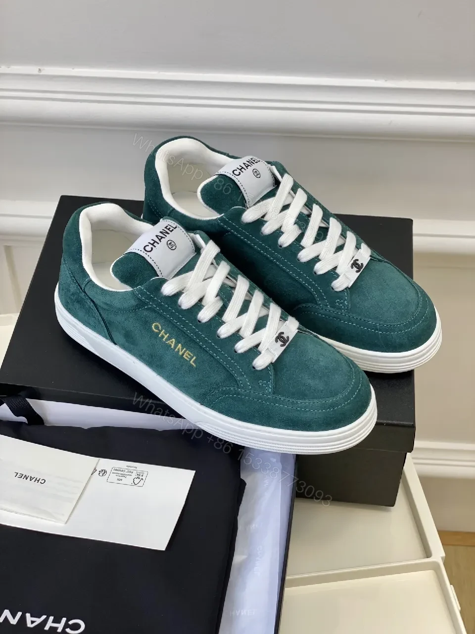 View 3 of Teal Suede Low-Top Sneakers with Signature Accents