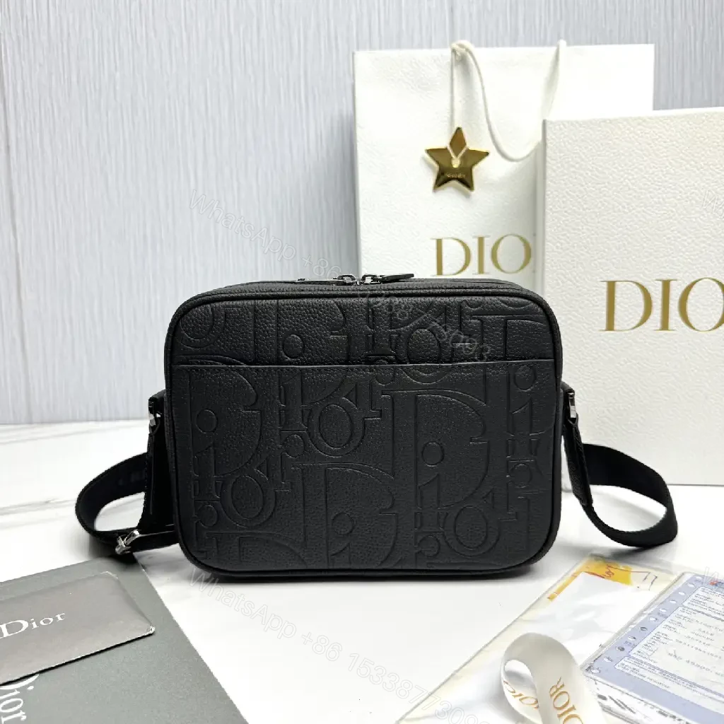 View 9 of Compact Leather Crossbody Bag - Embossed Texture, Luxury Minimalism