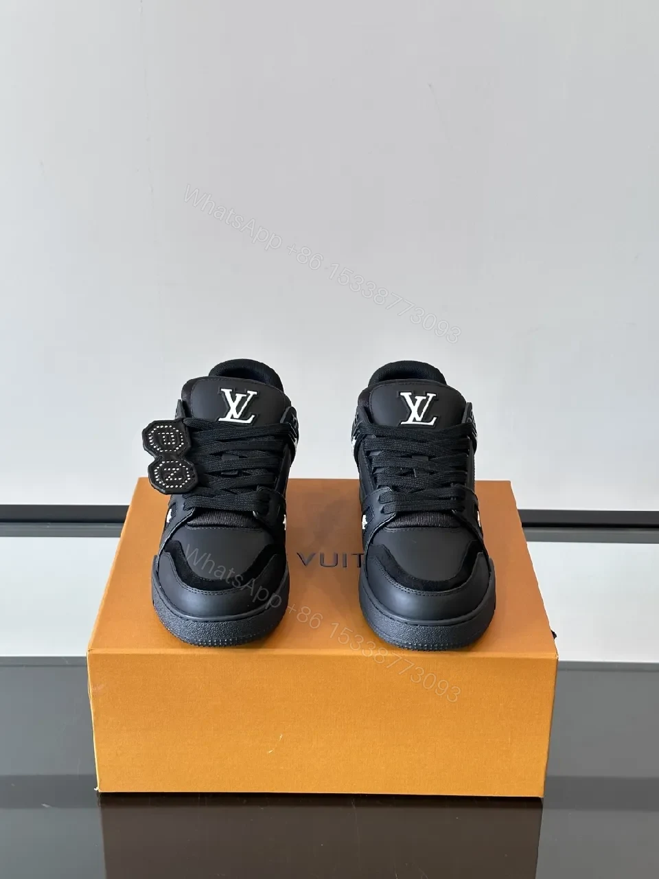 View 7 of Minimalist Black Leather Sneakers: Subtle Luxe Detailing High-Top