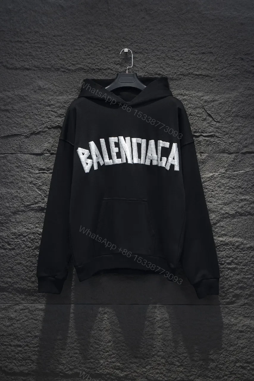 Bold Logo Hoodie: Metallic Silver Logo, Oversized Comfort — view 1