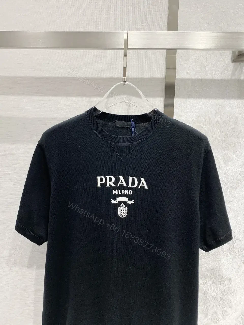 View 5 of Minimalist Cotton Tee with Crest – Elevated Everyday Essential