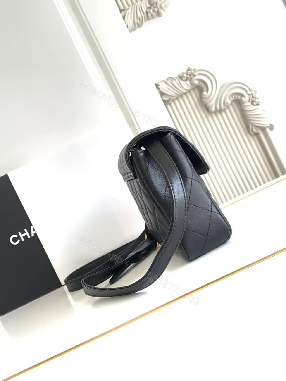 View 9 of Compact Black Quilted Bag with Gold Hardware