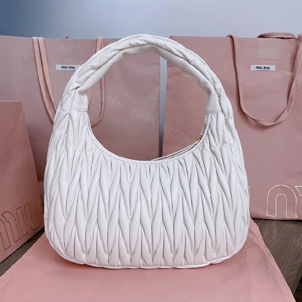 View 4 of Pearl White Quilted Handbag – Soft Gold Logo, Elegant Wave Stitching