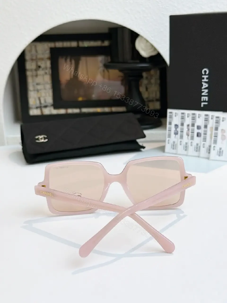 View 9 of Black Frame Oversized Sunglasses with Gold Chanel Logos, Matte Gray Lenses