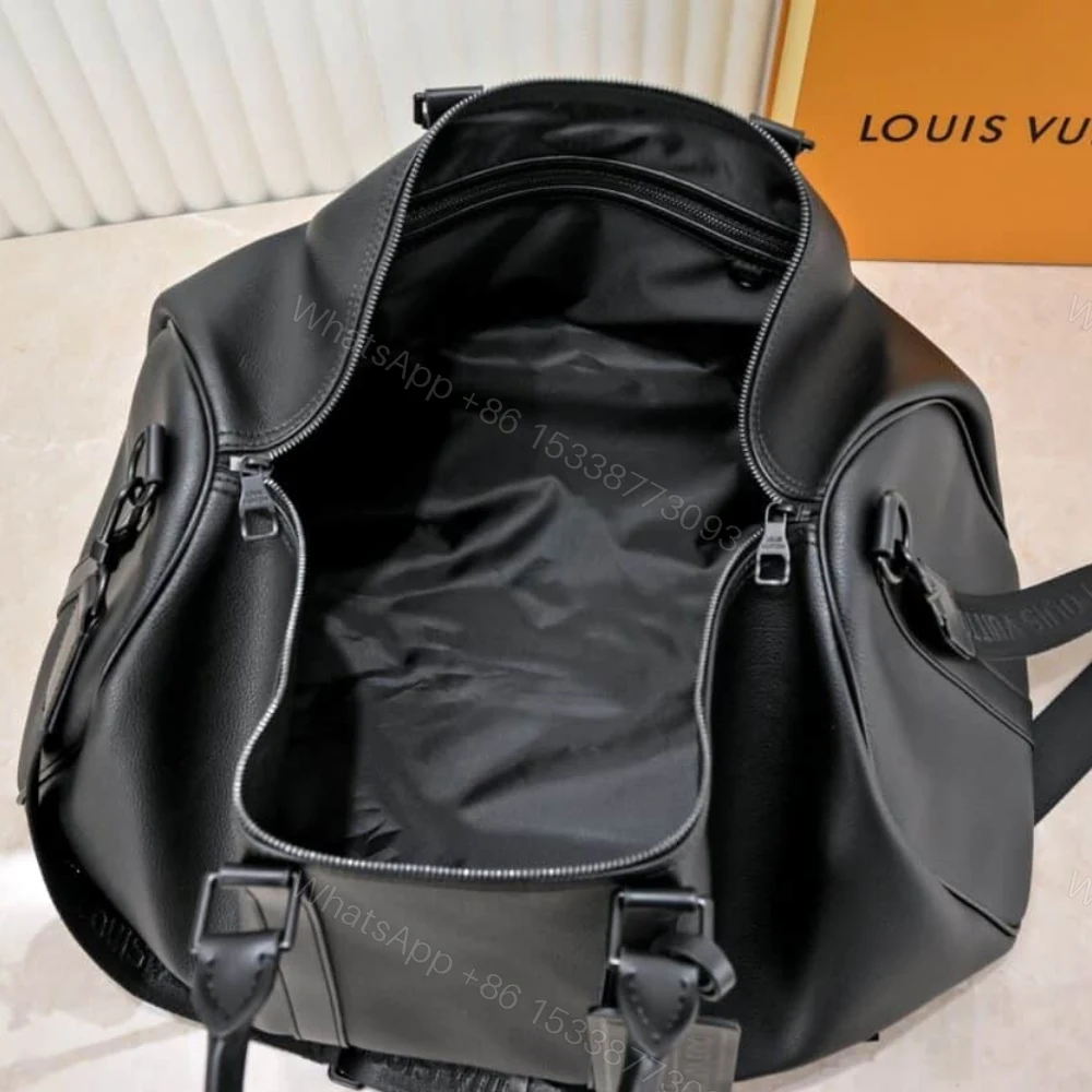 View 4 of Louis Vuitton Keepall Bandoulière 50 Black M21420