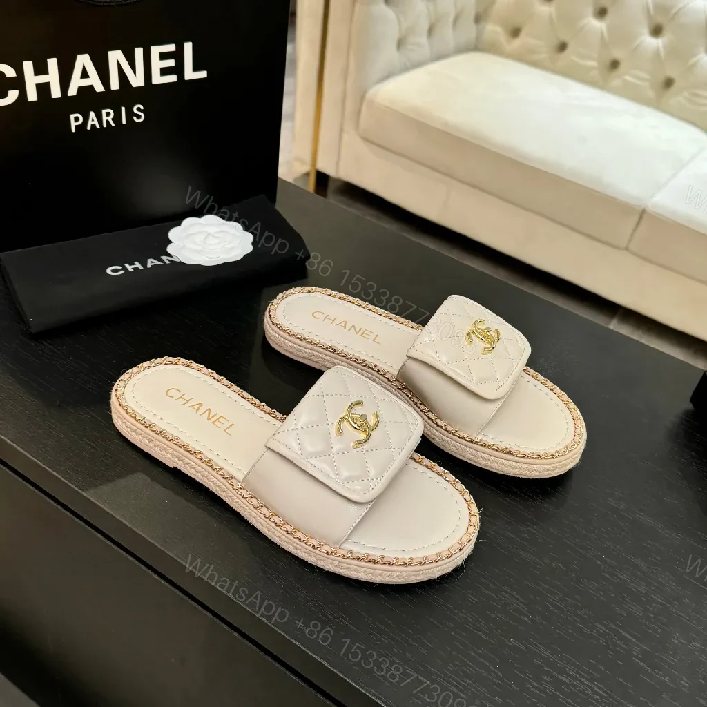 Quilted Leather Slides: Gold Logo, Luxe Casual Comfort — view 1