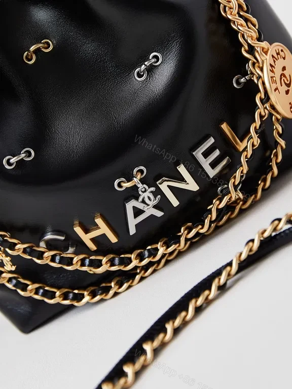 View 6 of Chanel-Inspired Mini Leather Drawstring Bag with Chain Detail