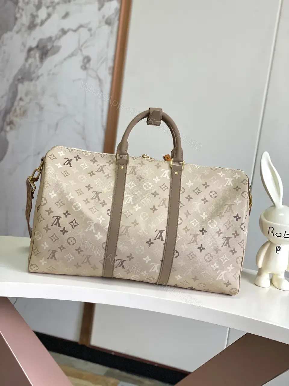 View 7 of Light Taupe LV Monogram Duffle — Canvas, Leather Trim, Top Zip, Recessed Gold Hardware